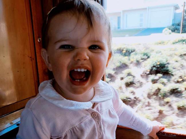 Anna Seagren loved chasing the chickens on her family’s farm. Picture supplied by family