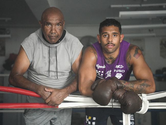 Josh Addo-Carr (right) with his granddad and former Australian boxing champion Wally Carr Photo: NRL Photos.