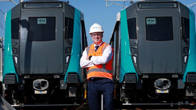 Sydney Metro CEO Jon Lamonte in front of two new trains. Picture: Toby Zerna