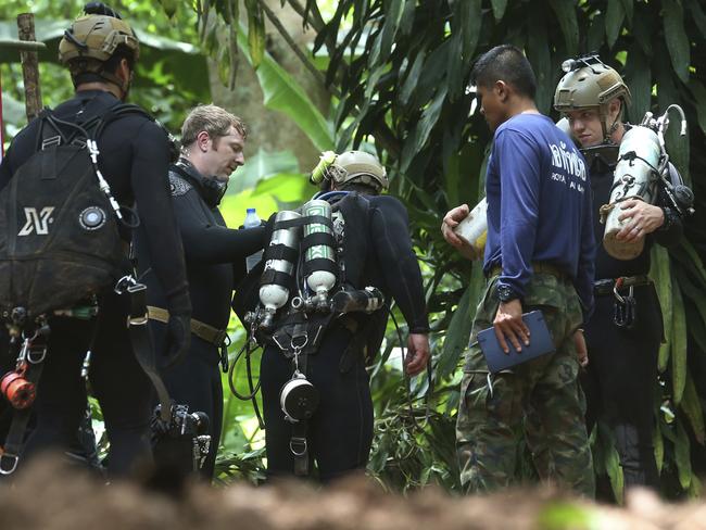 International rescuers get ready to enter the cave. Picture: Sakchai Lalit/AP