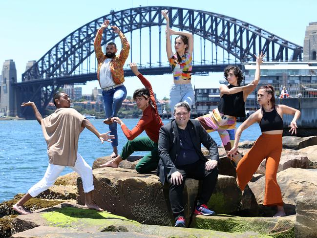 Bangarra Dance Theatre members Gusta Mara, Ryan Pearson, Beau Dean Riley Smith, Rika Hamaguchi, Nicola Sabatino and Lillian Banks with Sydney Festival Director Wesley Enoch at Barangaroo Reserve in Sydney. Bangarra is appearing on an outdoor stage at the Barangaroo headland, for the Sydney Festival in January. Britta Campion / The Australian