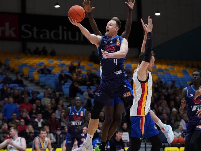 Brad Newley flies for the basket during a Melbourne United pre-season match. Picture: Melbourne United.