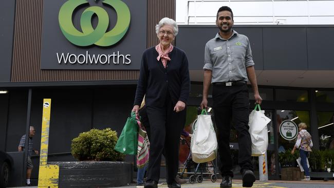 Margaret Turnbull with Woolworths staff member Davis De Rosairo who helped her after she began feeling faint in one of the store’s aisles. Picture: Andy Brownbill