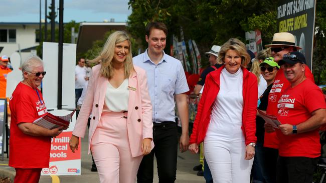 Corinne Mulholland (in the pink suit) on election day in 2019, in the seat of Petrie. Picture: David Clark