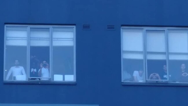 Asylum seekers watched the Saturday protest from their hotel windows. Picture: Supplied