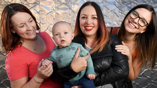 Cassandra Orlowski, Joelie Moncrieff with son Spike and Kelly Tschirpig (in glasses) all have endometriosis. Picture: Tricia Watkinson.