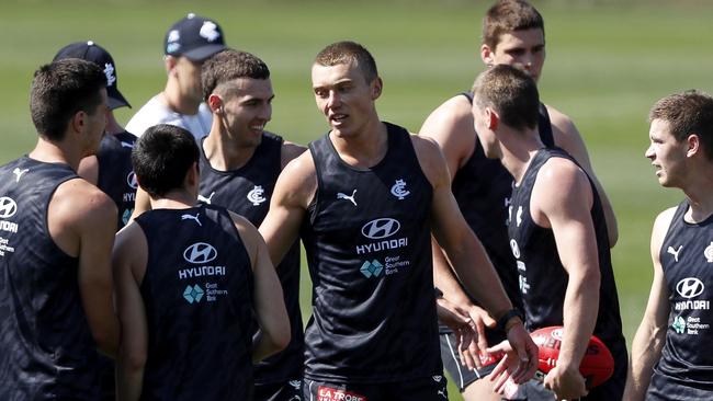 Patrick Cripps catches up with his teammates at Ikon Park. Picture: AFL Photos via Getty Images