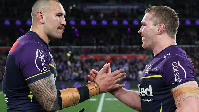 MELBOURNE, AUSTRALIA - SEPTEMBER 27:  Nelson Asofa-Solomona and Josh King of the Storm celebrate winning the NRL Preliminary Final match between the Melbourne Storm and Sydney Roosters at AAMI Park on September 27, 2024 in Melbourne, Australia. (Photo by Cameron Spencer/Getty Images)