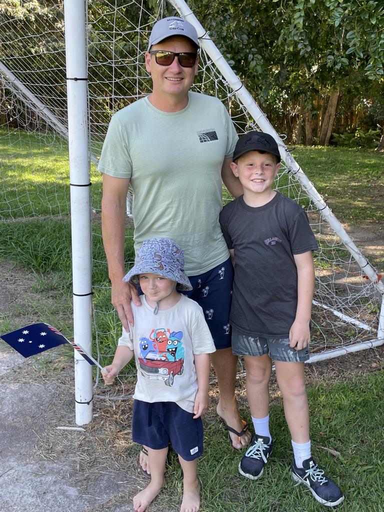 Adam Mangleson, 46, Caleb Mangleson, 9, Harry Nelson, 3, at the Australia Day Mullet Throwing Championship in Ocean Shores on January 26. Picture: Savannah Pocock.