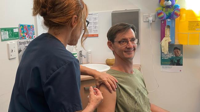 Ochre Health GP Dr Chris Taylor receiving the Covid Vaccination from nurse Mary-Anne Cole.