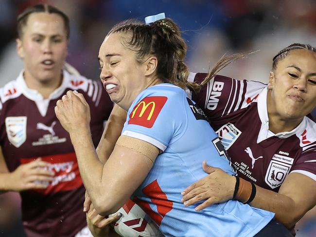 NEWCASTLE, AUSTRALIA - JUNE 06:  Kezie Apps of the Blues is tackled during game two of the Women's State of Origin series between New South Wales Sky Blues and Queensland Maroons at McDonald Jones Stadium on June 06, 2024 in Newcastle, Australia. (Photo by Cameron Spencer/Getty Images)