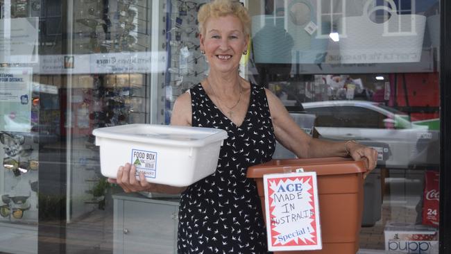 Ace Variety Discount owner Wendy Travers with some of the Australian-made plastic goods they now stock in their Maclean store.