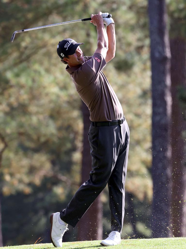 Adam Scott plays a shot on the first hole during a practice round at Augusta on Monday. Picture: Rob Carr / Getty Images