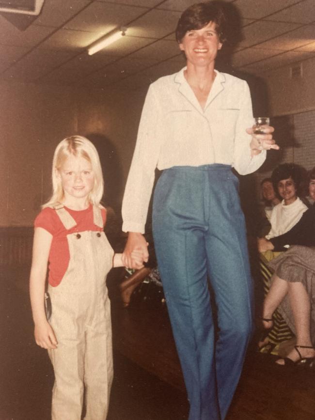 Image of Kate Mason as a child with her mum.