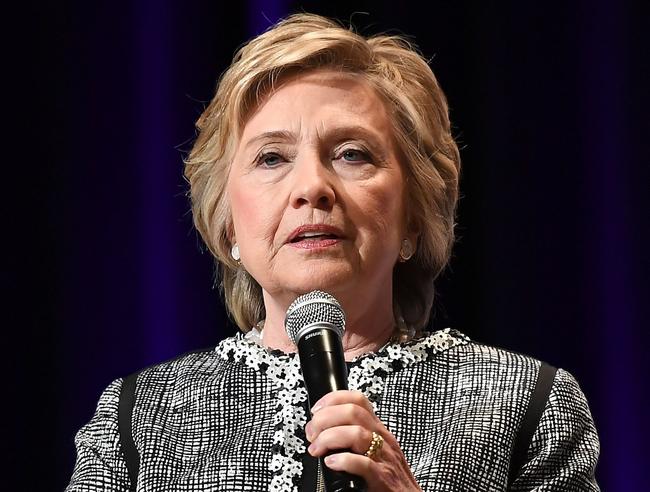 (FILES) In this file photo taken on June 1, 2017 Former Secretary of State Hillary Clinton speaks onstage with novelist Cheryl Strayed at "An Evening with Hillary Rodham Clinton"  during the BookExpo  in New York. Hillary Clinton says she should have sacked a male staffer accused of sexual misconduct while working on her 2008 presidential campaign.  Clinton made the remarks in a lengthy Facebook post the night of January 30, 2018 just minutes before President Donald Trump began his State of the Union address."I very much understand the question I’m being asked as to why I let an employee on my 2008 campaign keep his job despite his inappropriate workplace behavior," Clinton wrote. "The short answer is this: If I had it to do again, I wouldn’t."  / AFP PHOTO / ANGELA WEISS