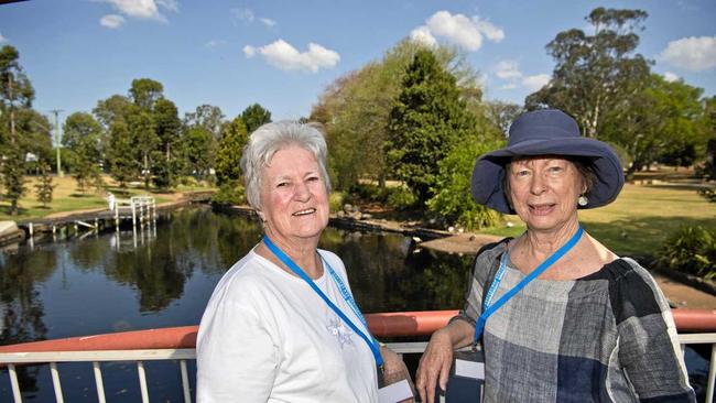 READY FOR THE CARNIVAL: New Zealand visitors Alison Read (left) and Sherry Bishop take in Lake Annand during a lunch stop on the first day of their week-long Carnival of Flowers tour. Picture: Kevin Farmer