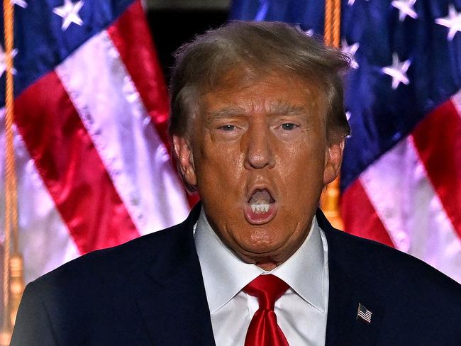 TOPSHOT - Former US President Donald Trump arrives to deliver remarks at Trump National Golf Club Bedminster in Bedminster, New Jersey, on June 13, 2023. Trump appeared in court in Miami for an arraignment regarding 37 federal charges, including violations of the Espionage Act, making false statements, and conspiracy regarding his mishandling of classified material after leaving office. (Photo by Ed JONES / AFP)