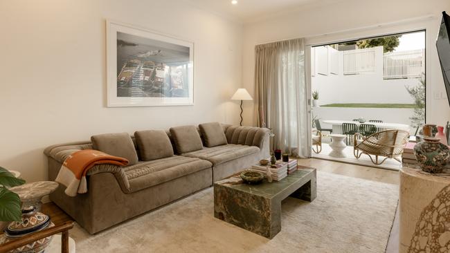 The property’s living room with its green onyx coffee table.