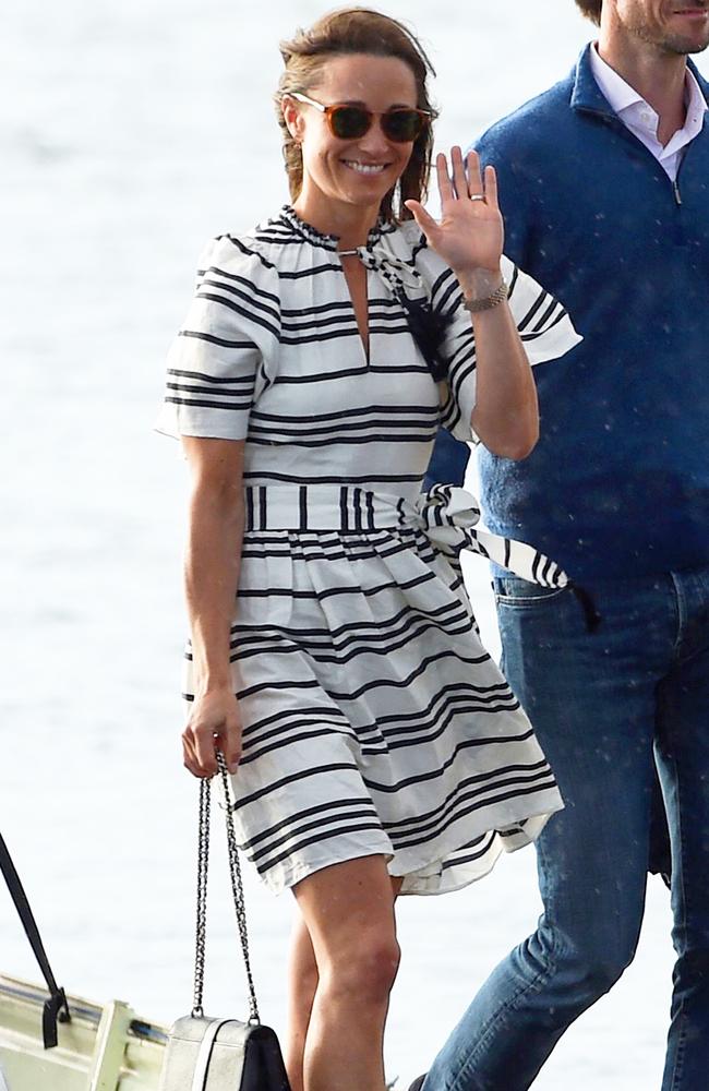 Pippa Middleton wore a Kate Spade dress during her honeymoon in Sydney, seen her at Rose Bay Wharf in 2017. Picture: AFP PHOTO / SAEED KHAN