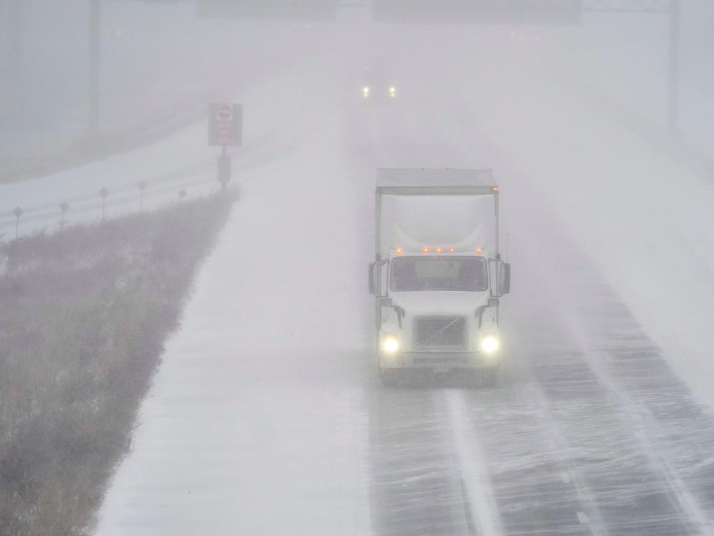 A transport truck navigates the elements in, Ontario, Canada. Picture: AFP