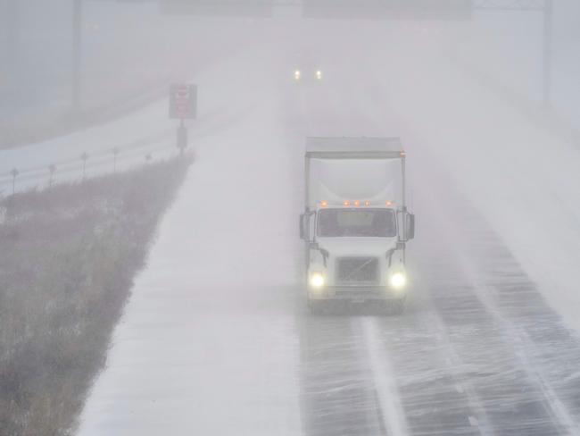 A transport truck navigates the elements in, Ontario, Canada. Picture: AFP