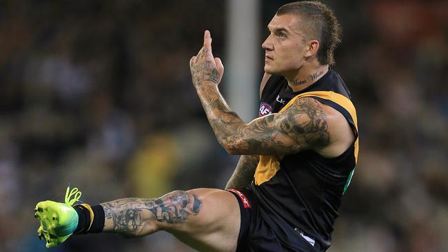 Dustin Martin kicking for goal against Port Adelaide. Picture: Wayne Ludbey