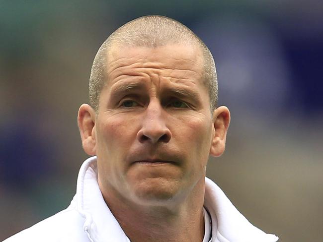 England's head coach Stuart Lancaster watches his team warm up before the start of their Six Nations rugby union match against Italy at Twickenham Stadium in London, Sunday, March 10, 2013. (AP Photo/Sang Tan)
