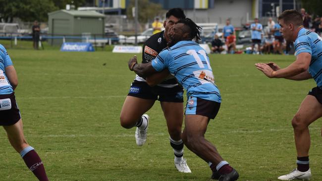 Tweed Seagull Herman Ese'ese loses a tooth in a head clash with CQ Capra Nixon Putt. Picture: Max Ellis / Tweed Seagulls