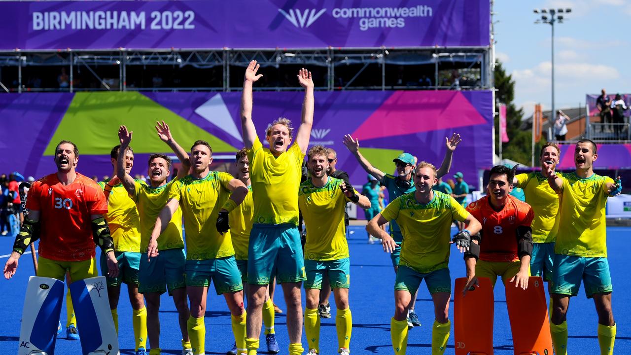 The Kookaburras start to celebrate. Photo by Shaun Botterill/Getty Images.