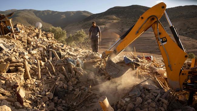 Rescue workers dig through rubble after an earthquake in the mountain village of Tafeghaghte, southwest of Marrakesh. Picture: AFP