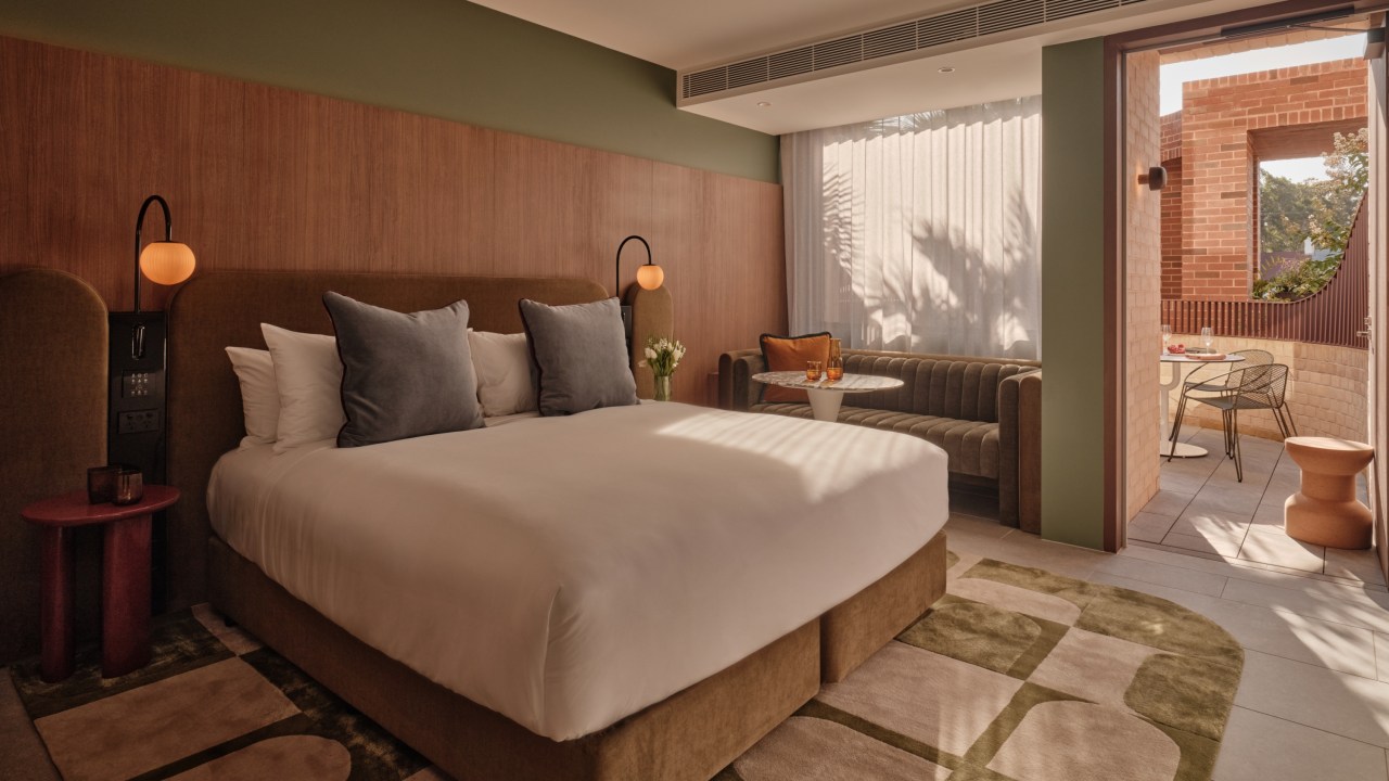 The Eve Hotel's rooms feature an autumn palette.