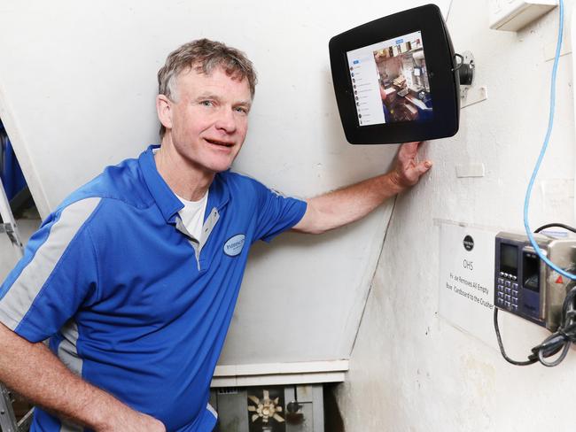 Bill Wilson at his Farm Fresh Foods supermarket in Paddington. He has just installed contactless clock-on clock-off technology for his staff. Picture: Richard Dobson