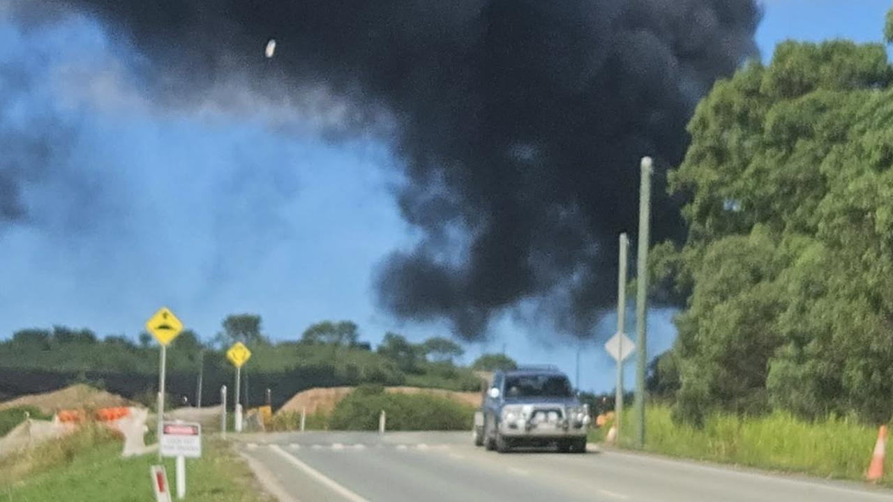 Huge fire rips through dump north of Brisbane