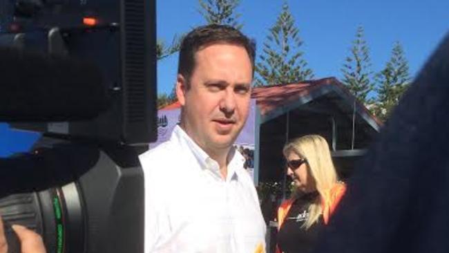 Moncrieff MP Steve Ciobo talking to voters outside the Broadbeach State School.