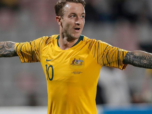 Australia's forward Adam Taggart celebrates his goal during the Group B FIFA World Cup 2022 and the 2023 AFC Asian Cup qualifying football match between Jordan and Australia in the Jordanian capital Amman on November 14, 2019. (Photo by Ahmad ALAMEEN / AFP)