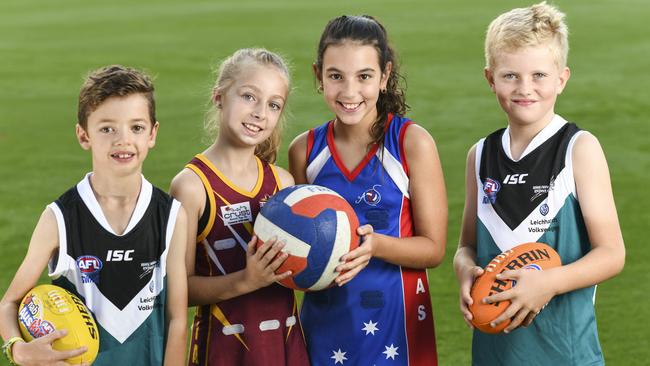 Jack Langman, Charlotte Hunter, Neve Russell, Mac Seebeck are in for big seasons of their chosen codes. Aussie rules and netball have had numbers boosted by the voucher scheme. Picture: Darren Leigh Roberts