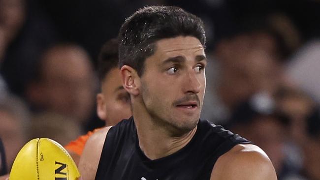 MELBOURNE, AUSTRALIA - APRIL 20:  Marc Pittonet of the Blues runs with the ball during the round six AFL match between Carlton Blues and Greater Western Sydney Giants at Marvel Stadium, on April 20, 2024, in Melbourne, Australia. (Photo by Darrian Traynor/Getty Images)