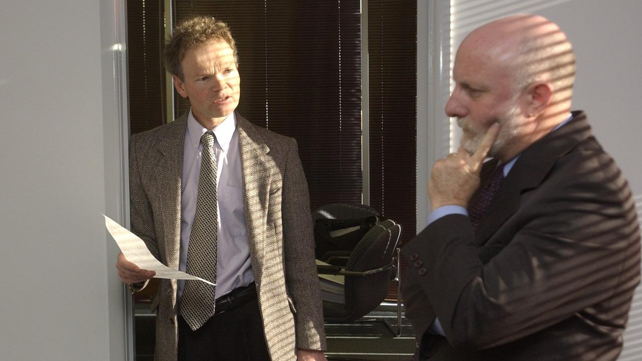 Paul Templeton's legal team of barrister Robbie Davies (left) and instructing solicitor David Burns discussing their client’s case. September 2004. Photo Bev Lacey / The Chronicle