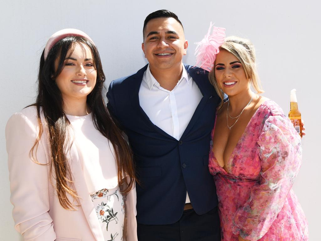 Frederica Random, Jonah Brown and Danielle Jones at the Darwin Turf Club Bridge Toyota Ladies' Day / Derby Day. Picture: KATRINA BRIDGEFORD