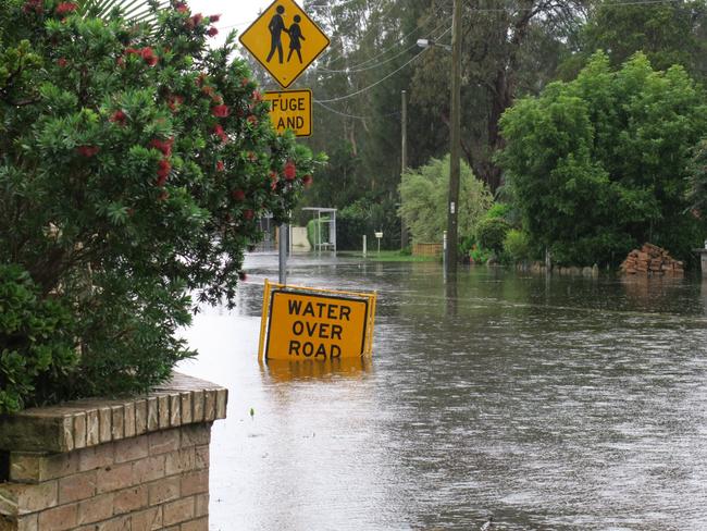 Flooding on Lakedge Ave, Berkeley Vale after torrential rain at the weekend. Picture Richard Noone