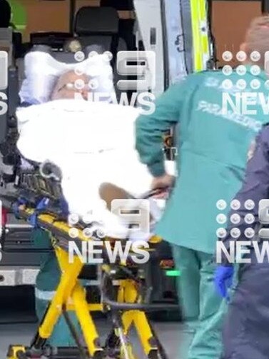 Perre being taken to hospital following the verdict. Picture: Nine News.