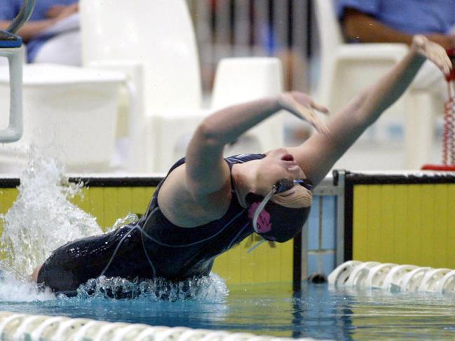 Melissa Mitchell, in the 16 years 100m backstroke at the 2004 NSW Championships at the Warringah Aquatic Centre. Picture: Roy Haverkamp.