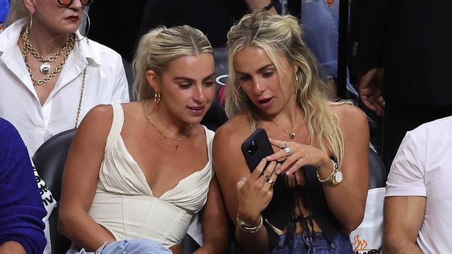 MIAMI, FLORIDA - JUNE 09: Haley and Hanna Cavinder are seen in attendance during Game Four of the 2023 NBA Finals between the Denver Nuggets and the Miami Heat at Kaseya Center on June 09, 2023 in Miami, Florida. NOTE TO USER: User expressly acknowledges and agrees that, by downloading and or using this photograph, User is consenting to the terms and conditions of the Getty Images License Agreement. (Photo by Megan Briggs/Getty Images)