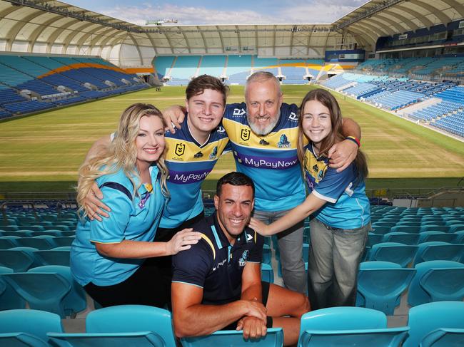 Retiring Titans rugby league player Corey Thompson (front) with Titan fans Lisa Forrest, William Forrest 16, Adam Brown and Luca Brown 12, at Cbus Super Stadium. Picture Glenn Hampson