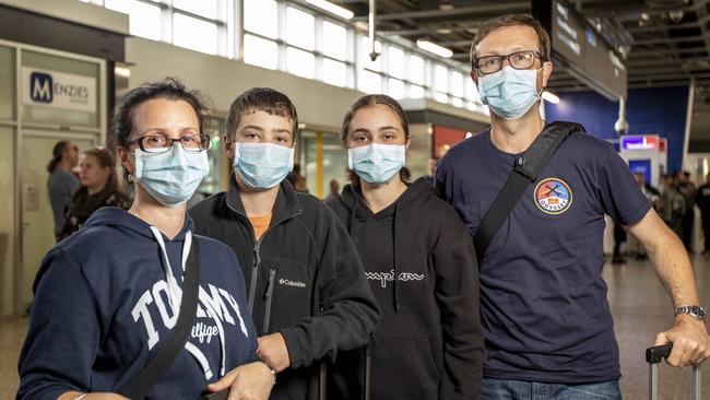 Bernadette, 50, Sebastian, 12, Gemma, 14 and Jason Eve, 48, return home from Rome. Picture: Tim Carrafa