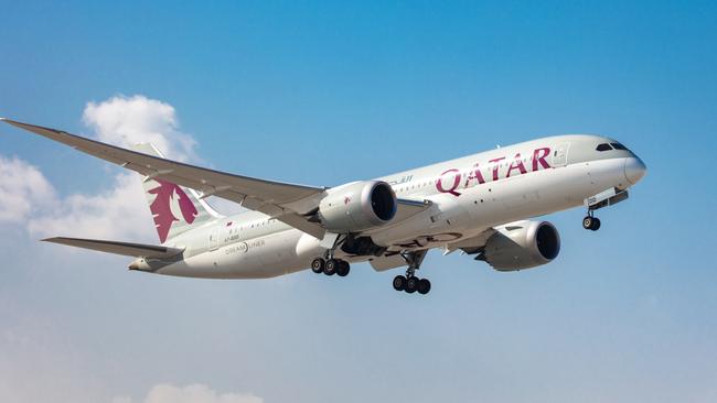 ESCAPEQatar Airways planePhoto - Qatar