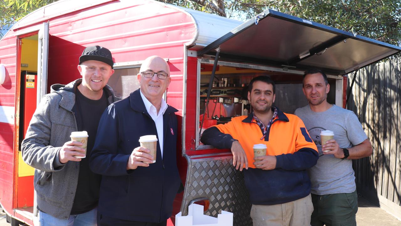 Lucas Edwards, Salvation Army Major Peter McGuigan, Tim Hiah and project coordinator Damian Rawlings.