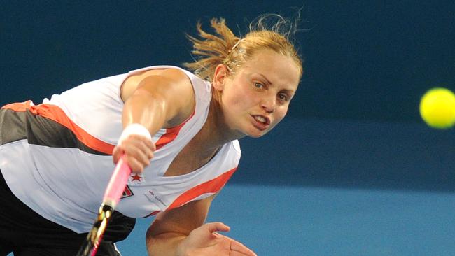 Australia's Jelena Dokic serves during her first round match against Anastasia Pivovarova of Russia at the Brisbane International tennis tournament in Brisbane, Monday, Jan. 3, 2011. (AAP Image/Dave Hunt) NO ACHIVING