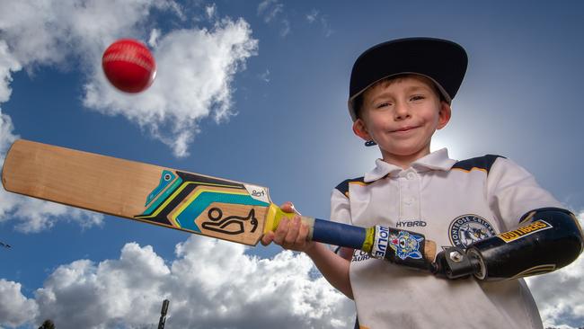 Maverick, 5, uses his cricket prosthetic arm to bat for Montrose cricket Club. Picture: Jay Town