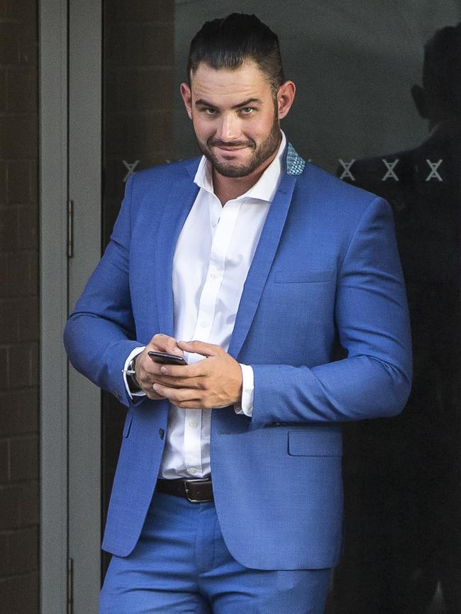 Sam Ball leaves his apartment on Saturday. Picture: Damian Shaw